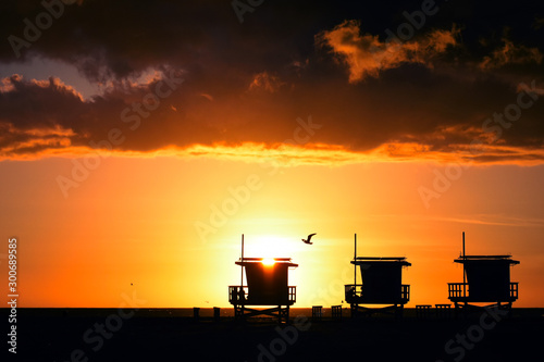 Lifeguard Towers on Beach at Sunset