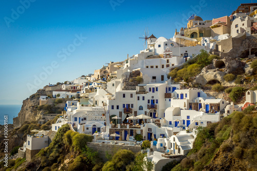 Little houses in the cliff at Santorini in Greece. Travel, city, explore, summer concept.