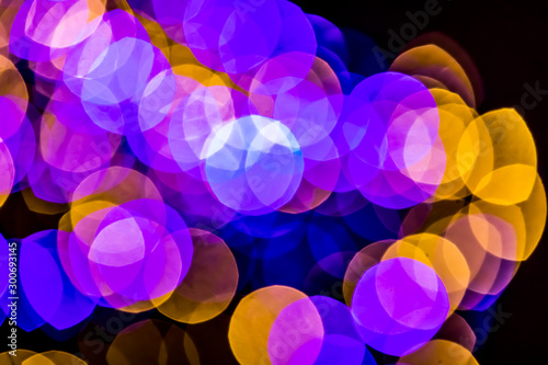 Colourful Christmas lights bokeh background.