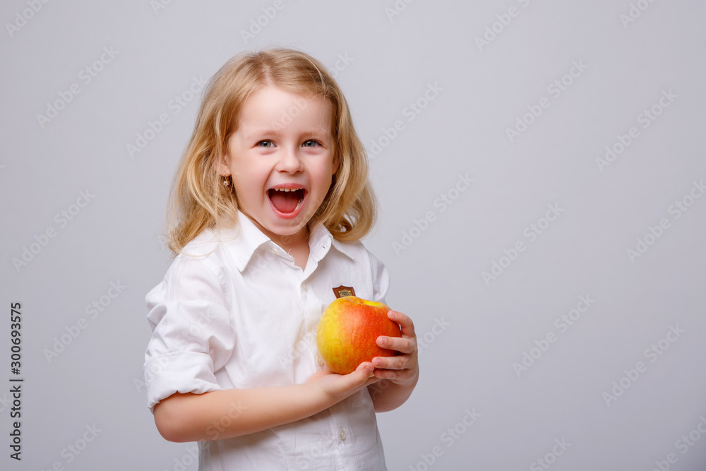baby girl hold red Apple on white background baby girl hold red Apple on white background