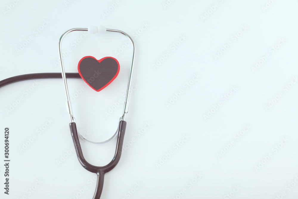 Red heart with stethoscope on white background Red heart with stethoscope on white background