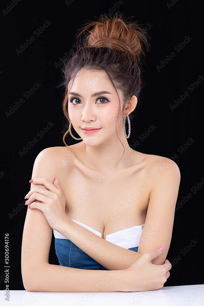 Fototapeta premium Portrait of beautiful young asian woman clean fresh bare skin concept. Asian girl beauty face skincare and health wellness, Facial treatment, Perfect skin, Natural make up isolated on black background