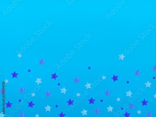 Shiny stars background Design template with copy space Many decorative glitter stars on blue backdrop