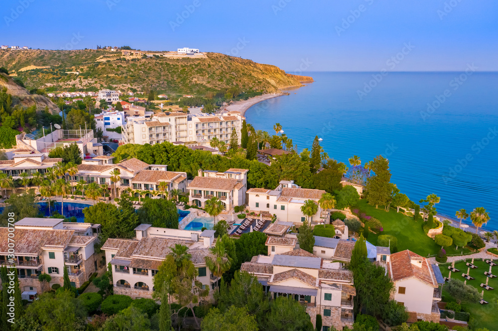Island of Cyprus. The Village Of Pissouri. Tourist area on the Mediterranean coast. The view from the top of the resort of Pissouri. Holidays in Cyprus. Hotels, trees and the Mediterranean sea.
