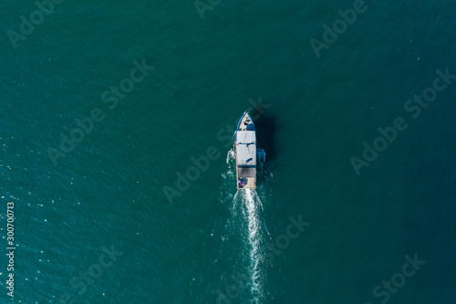 Aerial image of fisherman boat moving on open sea at Kudat, Sabah, Borneo © alenthien