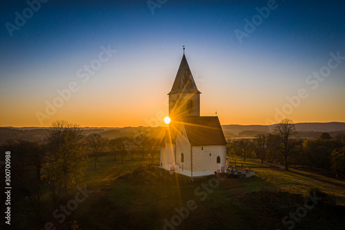 Church of St. James in Chvojno dates from the 13th century. It is situated on a hill above the Baroque farmyard Chvojen in the cadastral area of the town Benesov near by Prague.