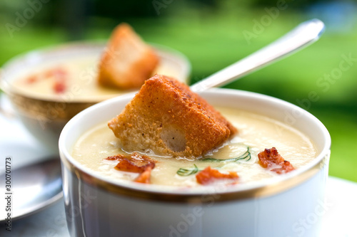 Green tomato soup with bacon and brioche croutons