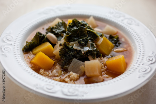 Couscous with winter vegetables and beans photo