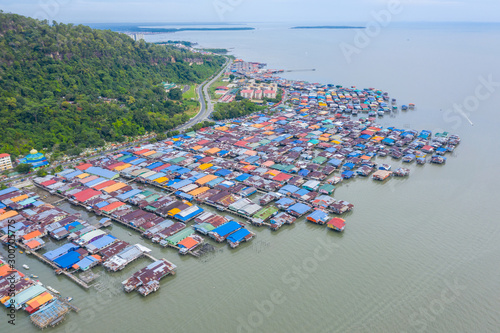 An aerial image of local water village houses at Kg. Sim Sim water village Sandakan City  Sabah  Malaysia. Sandakan once known as Little Hong Kong of Borneo.