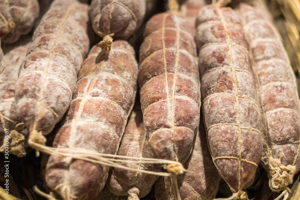 A basket of traditional Italian salami meats A basket of traditional Italian salami meats
