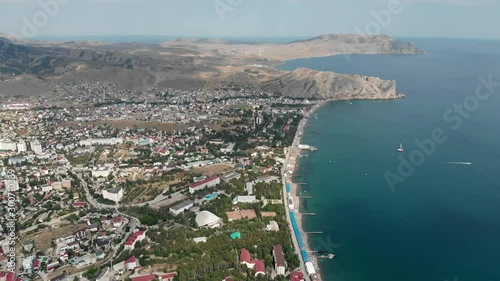 The view from the heights of the resort town of Sudak located on the Crimean peninsula. Russia. A popular destination for vacations and holidays on the Black Sea.