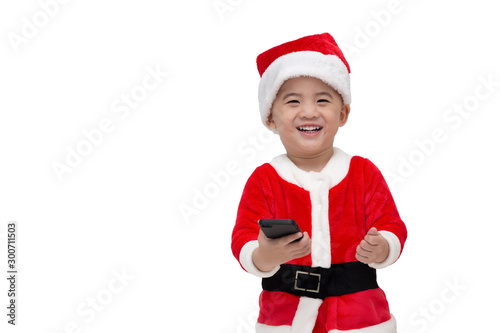 Happy asian baby boy Santa Claus holding mobile phone isolated on white background