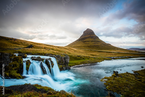 The picturesque sunset over landscapes and waterfalls. Kirkjufell mountain, Iceland © hardyuno