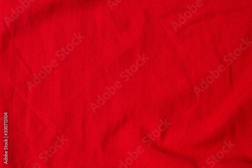 red crumpled texture fabric top view