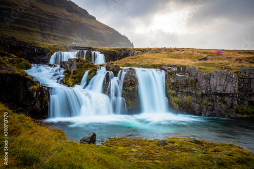 The picturesque sunset over landscapes and waterfalls. Kirkjufell mountain, Iceland © hardyuno