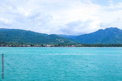 tropical sea shore with hills