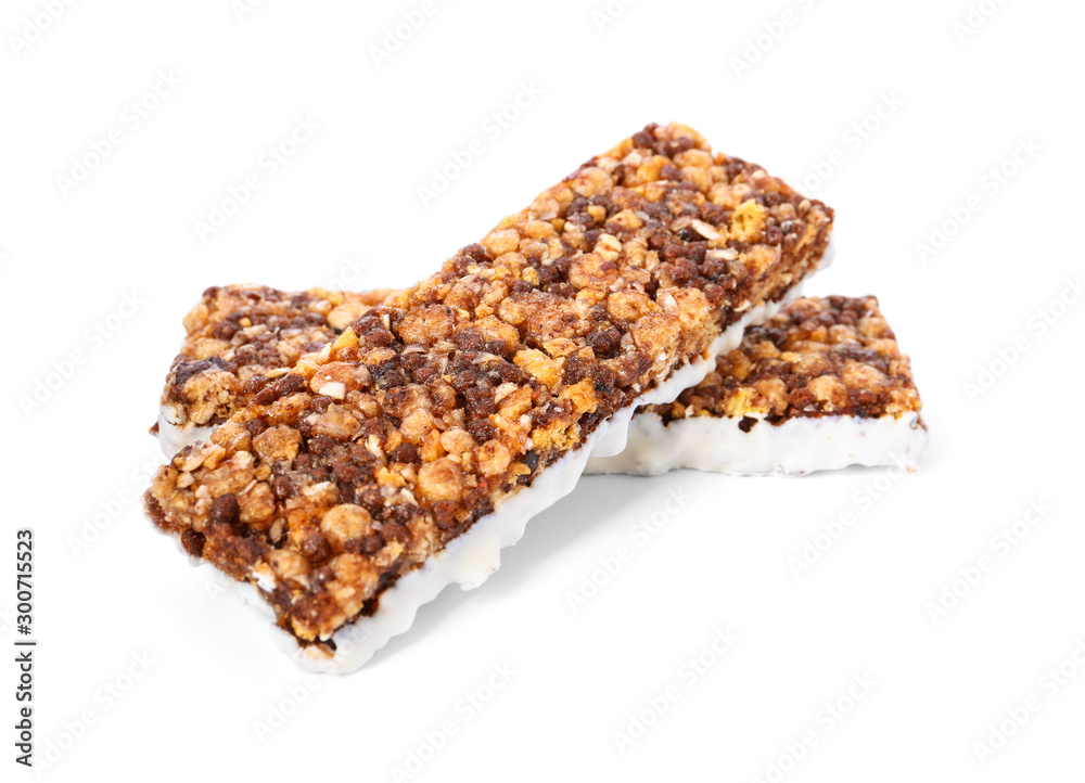 Tasty granola bars on white background. Healthy snack