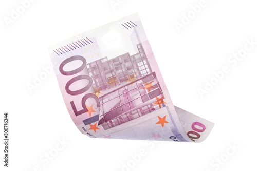 Flying five hundred Euro banknote isolated on white photo