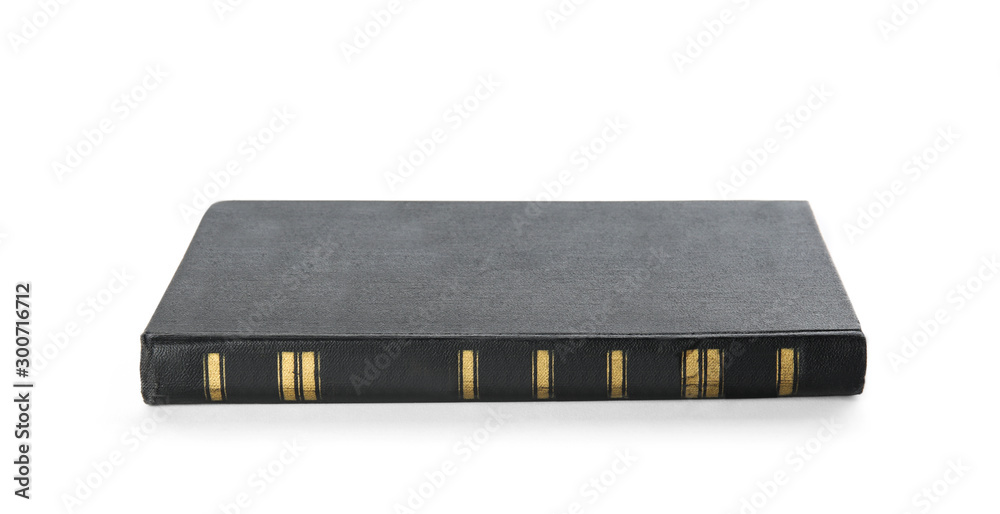 Fototapeta premium Closed color hardcover book on white background