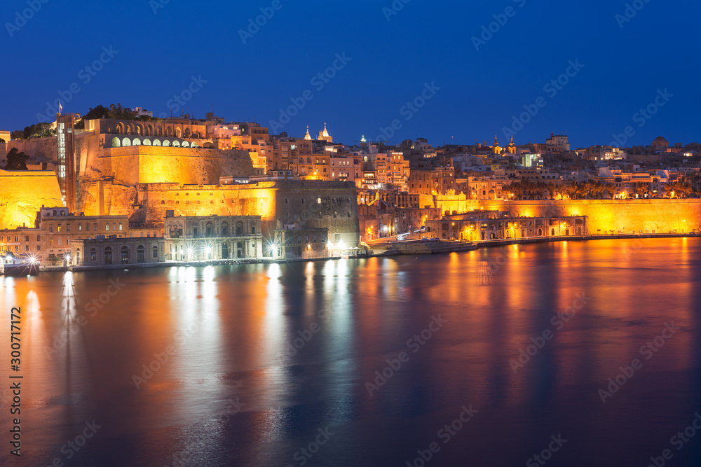 Night view to Valletta Waterfront and Upper Barrakka Gardens. Grand Harbour, Malta