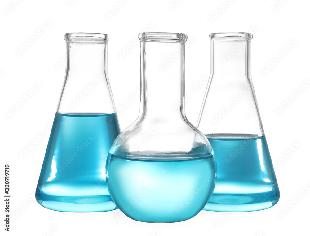 Glassware with liquids isolated on white. Laboratory analysis Glassware with liquids isolated on white. Laboratory analysis