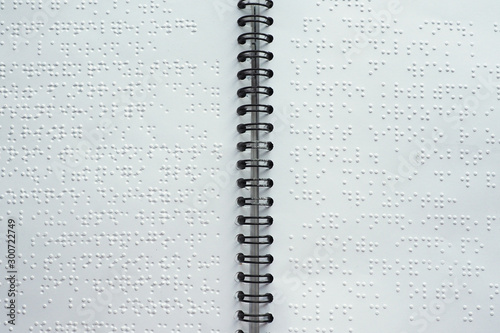 Braille font on paper. Close-up. Children's book...