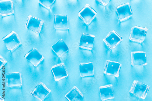 Fototapeta Naklejka Na Ścianę i Meble -  abstract background with ice cubes on blue background, flat lay