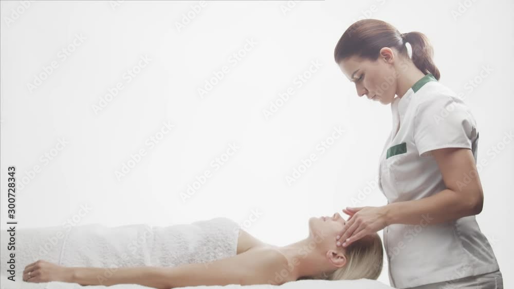 Young, beautiful and healthy woman in spa salon. Traditional Thai massage therapy and skin care. Young, beautiful and healthy woman in spa salon. Traditional Thai massage therapy and skin care.