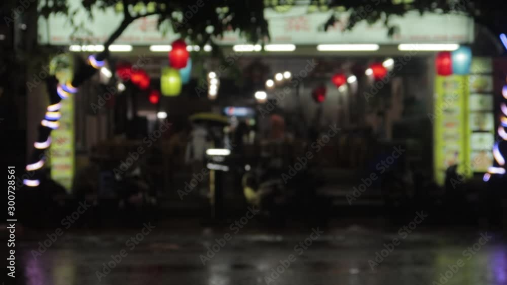 Nha Trang, Khanh Hoa / Vietnam - 08.02,2019: Vietnam's evening streets with lighting from shops, signboards, passing mopeds, motorbikes, cars and carts Nha Trang, Khanh Hoa / Vietnam - 08.02,2019: Vietnam's evening streets with lighting from shops, signboards, passing mopeds, motorbikes, cars and carts