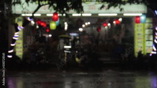 Wallpaper Mural Nha Trang, Khanh Hoa / Vietnam - 08.02,2019: Vietnam's evening streets with lighting from shops, signboards, passing mopeds, motorbikes, cars and carts Torontodigital.ca