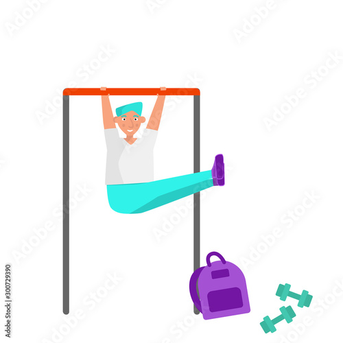 Bodyweight concept. Strong young fit man is doing exercises for the abs muscles hanging on horizontal bar.