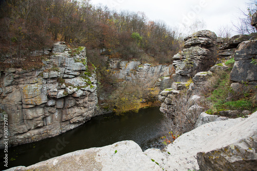 View of rocks and the river of the Buksky canyon. River and cliff. Beauty of autumn nature. photo