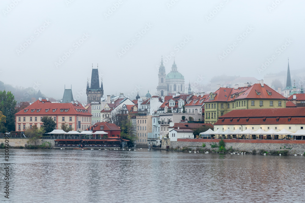 The detail of the entrance to Devil Stream, a tiny canal from vltava river into the center of Lesser Quarter of Prague, historical settlement of capitol of Czech Republic.