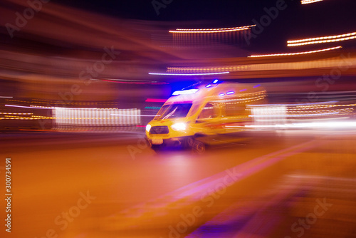 Ambulance is rushing to a call to a sick call