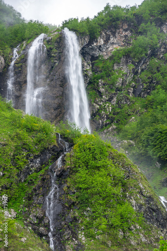 View of the waterfall in Caucasian mountains © gumbao