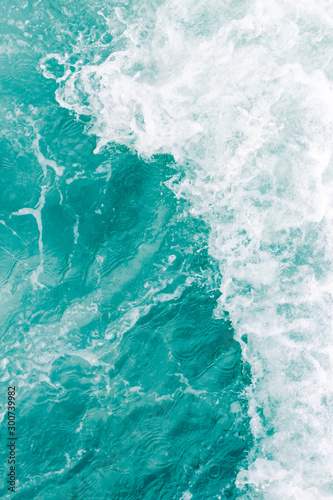 Olive green ocean gentle breeze wave during summer tide, abstract sea nature background © Bogdan