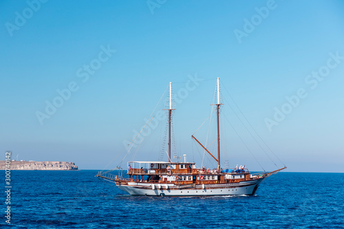 Yachts and sailing boats on the Aegean Sea in the Greek Islands near Santorini Island