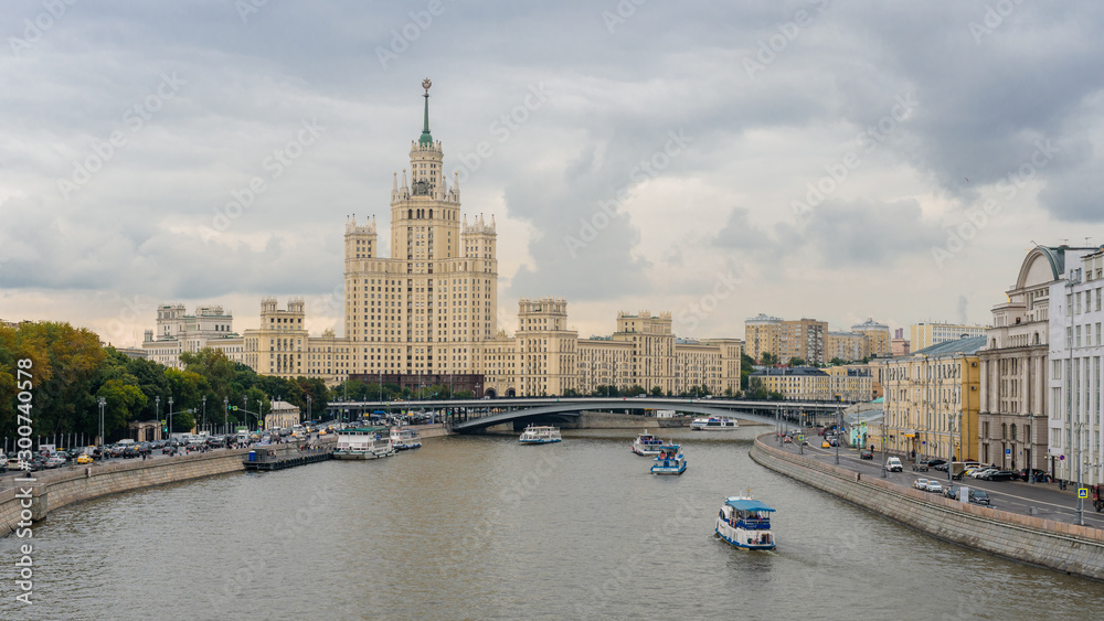MOSCOW, RUSSIA - July 12, 2019. Cityscape with Moscow-river and famous Stalin's skyscraper on Kotelnicheskaya embankment.