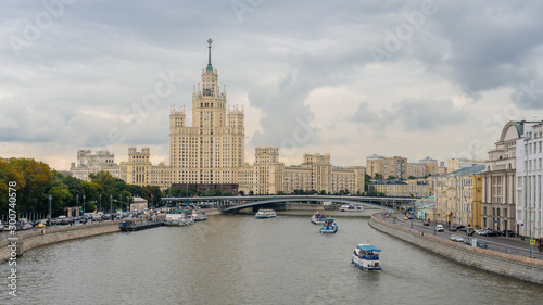 MOSCOW, RUSSIA - July 12, 2019. Cityscape with Moscow-river and famous Stalin's skyscraper on Kotelnicheskaya embankment. © Вячеслав Степанов