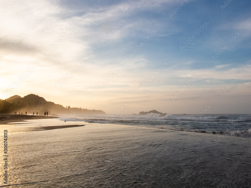 Sunset at the beach in Tayrona National Park in Colombia