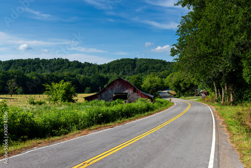 An old wood barn along a country road in rural Tennessee, USA