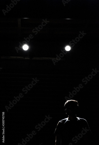 silhouette of a man on black background