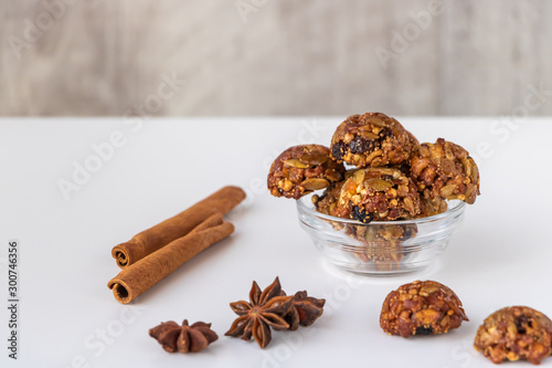 Energy and healthy sweets made from cereals, quinoa, dried nuts, seeds, dried fruits and honey. Cereal crunchy sweet snacks. Homemade useful candies. Raw and vegan sweets.