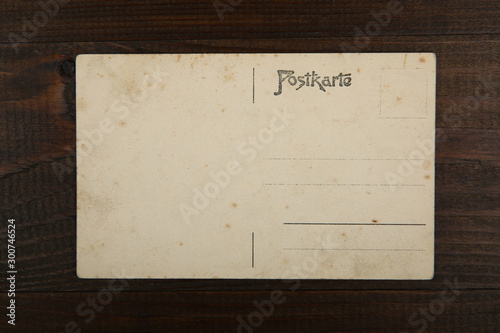 vintage post card on wooden background