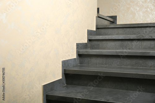 gray stone steps in the house. granite gray staircase