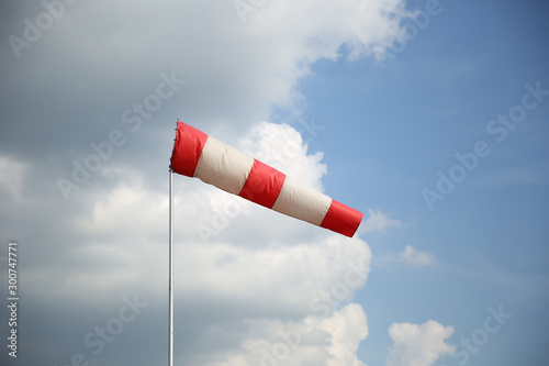 windsock on the background of sky with clouds