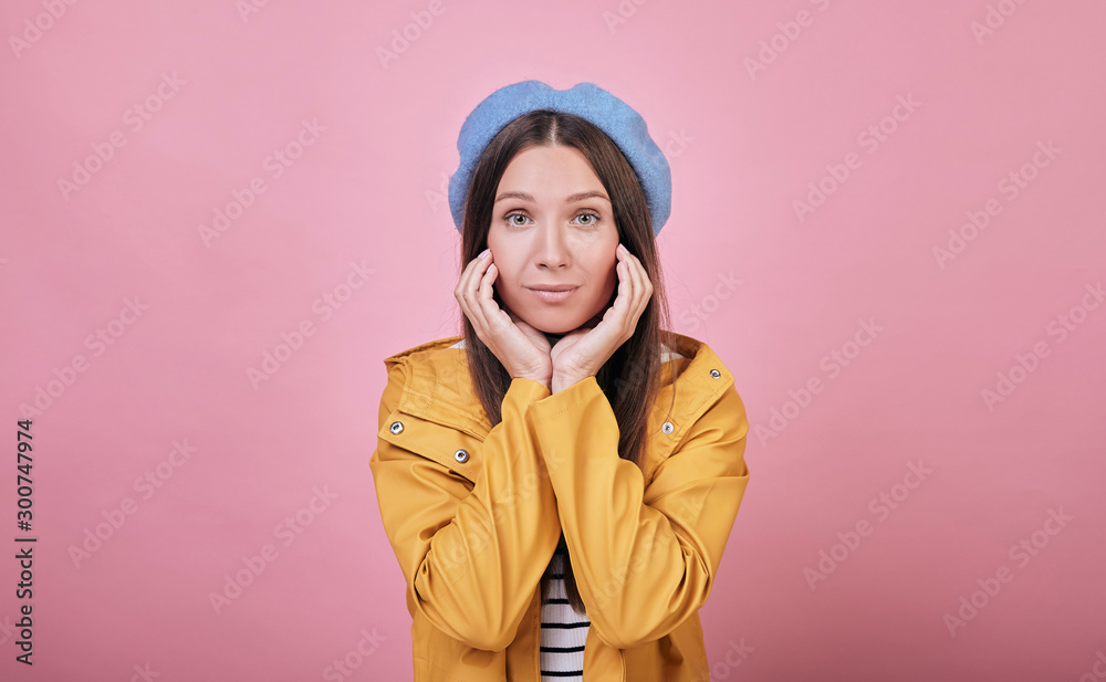 Cool girl in a gentle blue beret and striped blouse Cool girl in a gentle blue beret and striped blouse