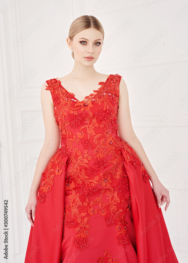 Woman in evening Red Dress, Beautiful Fashion Model on white background. Woman in evening Red Dress, Beautiful Fashion Model on white background.