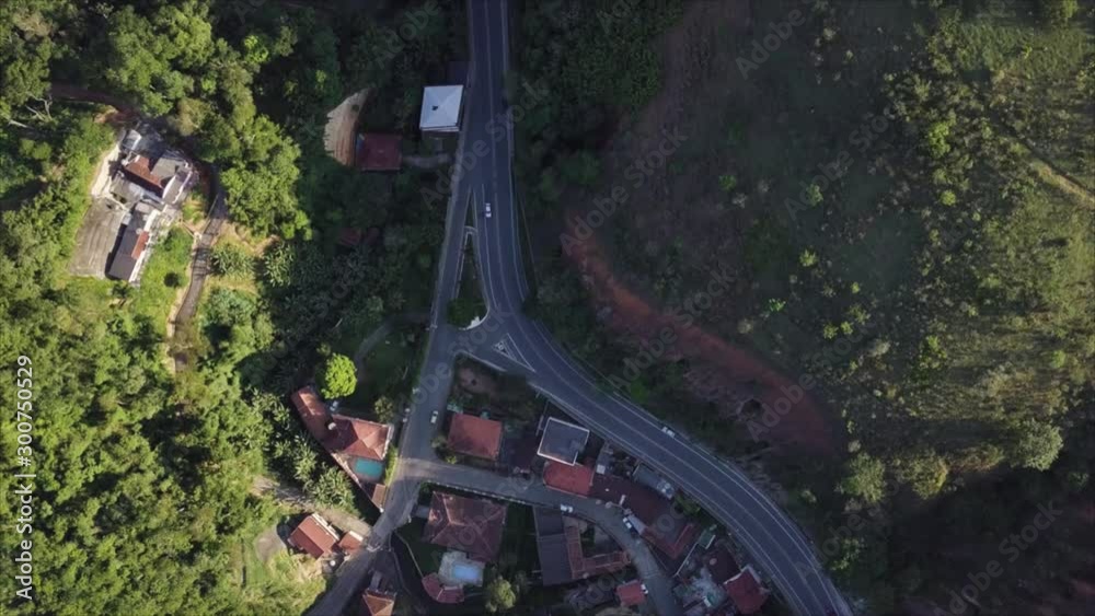 Bird's eye view flying above main road in Mendes, Rio de Janeiro, Brazil. Bird's eye view flying above main road in Mendes, Rio de Janeiro, Brazil.