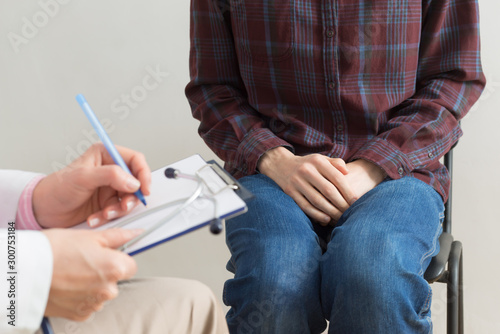 A man at a doctor s consultation. Pain in the urine. The concept of the prostate.